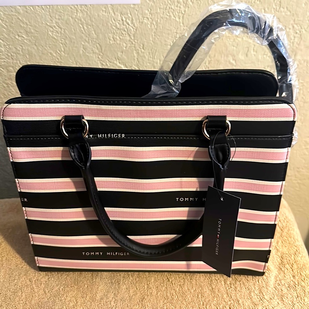 Tommy Hilfiger nice color black with pink strips nice hard leather